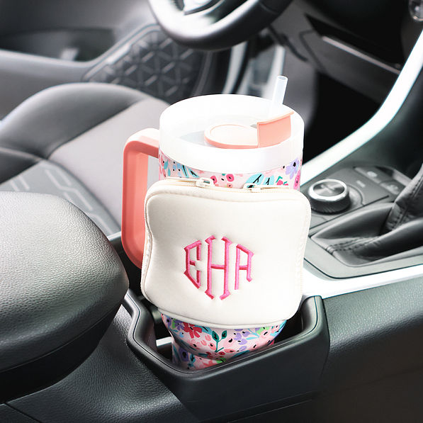 ivory water bottle belt bag in car