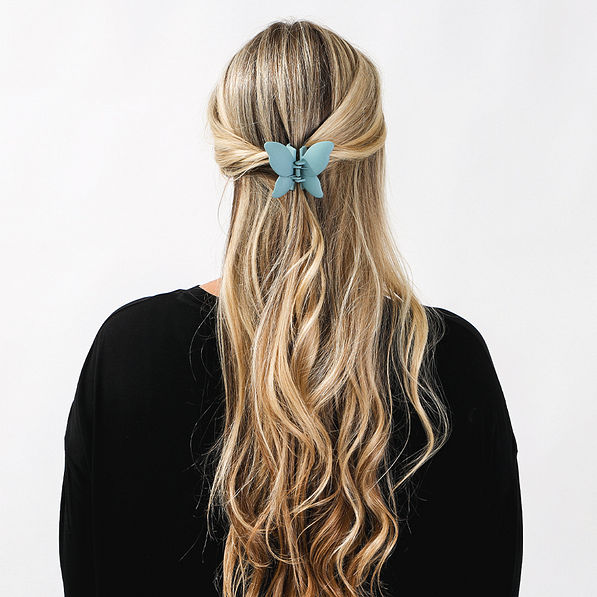 blue butterfly hair clip set in hair