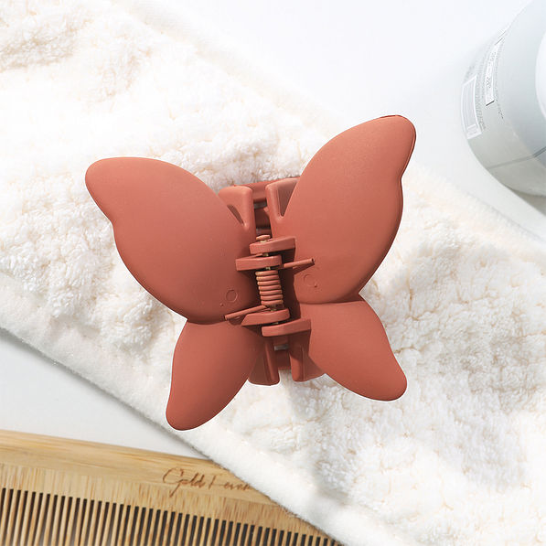 rust butterfly hair clip set flatlay