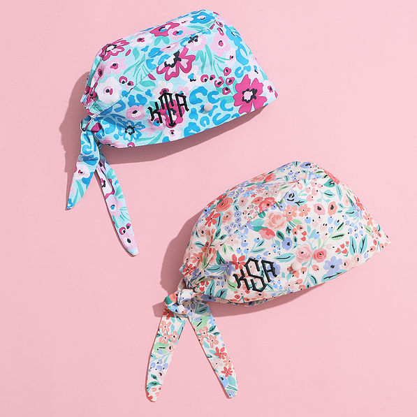 wild blooms and coral floral monogrammed scrub caps together
