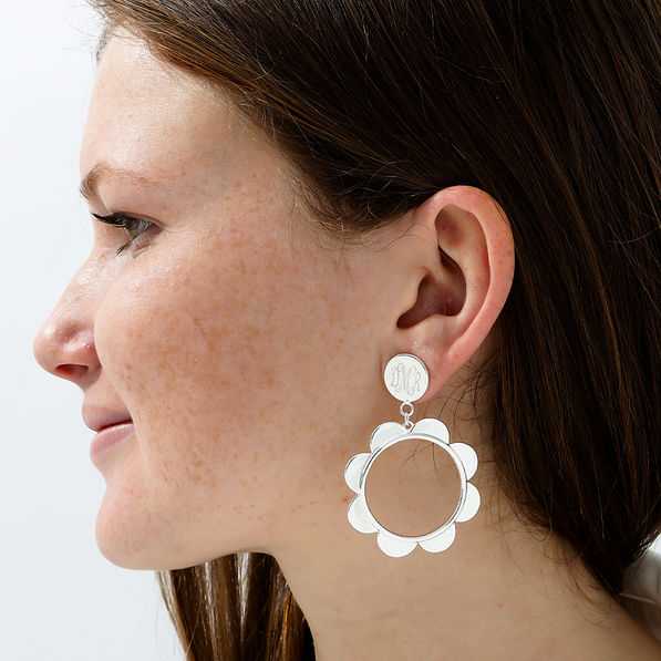 Monogrammed Scallop Earrings on ear