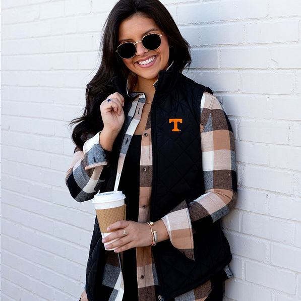 Brunette wearing Tennessee Puffer Vest