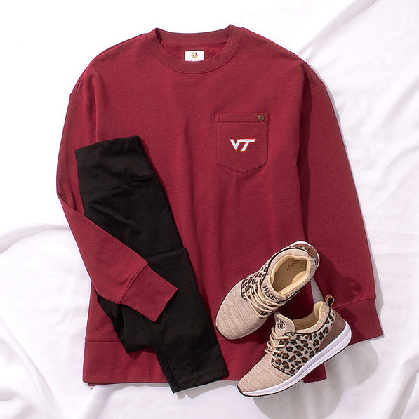 Virginia Tech crimson crewneck outfit styled with leggings and leopard sneakers