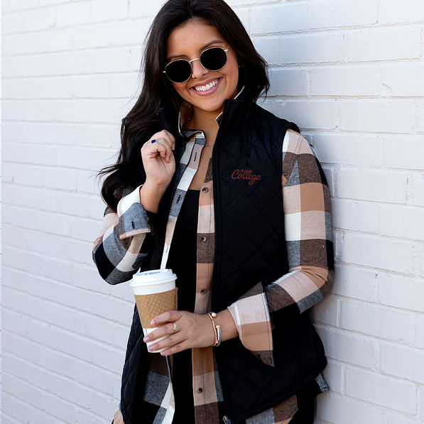 college of charleston puffer vest girl touching collar