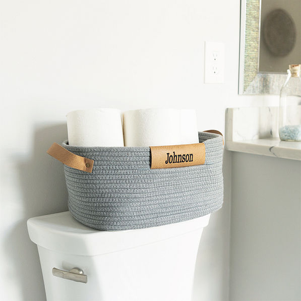 gray basket in bathroom
