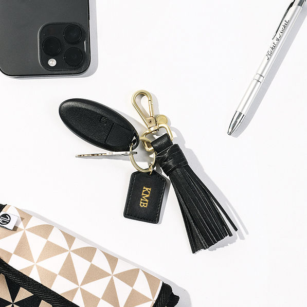 black and gold monogrammed tassel key fobs 2025