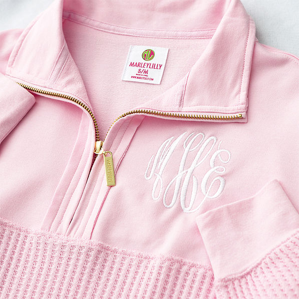 light pink waffle knit pullover up close