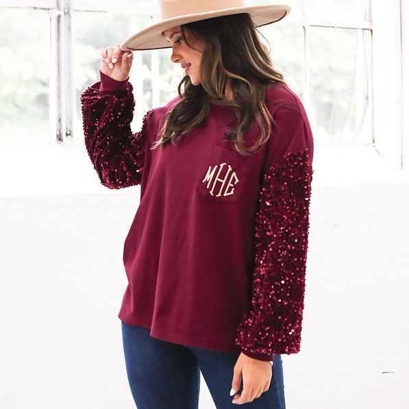 burgundy sequin sweatshirt on peyton