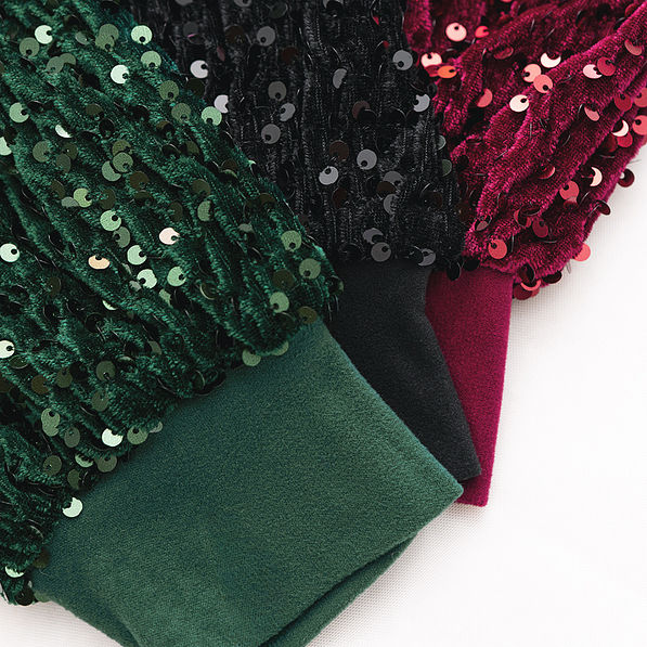 emerald black and burgundy sequin sleeve sweatshirts up close