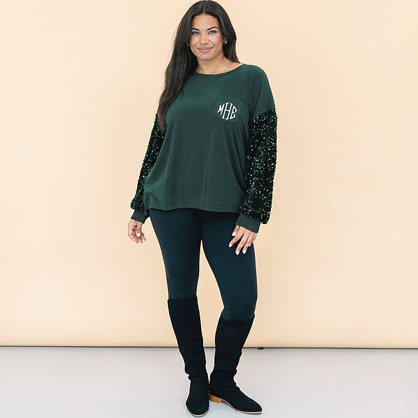 girl wearing personalized emerald sequin sleeve sweatshirt