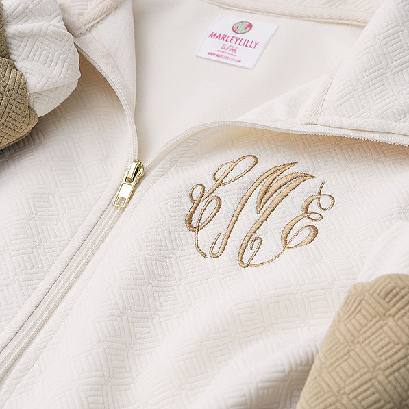 tan pullover tunic close up of quilted texture