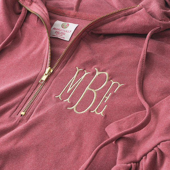 close up detail shot of monogrammed rose hoodie