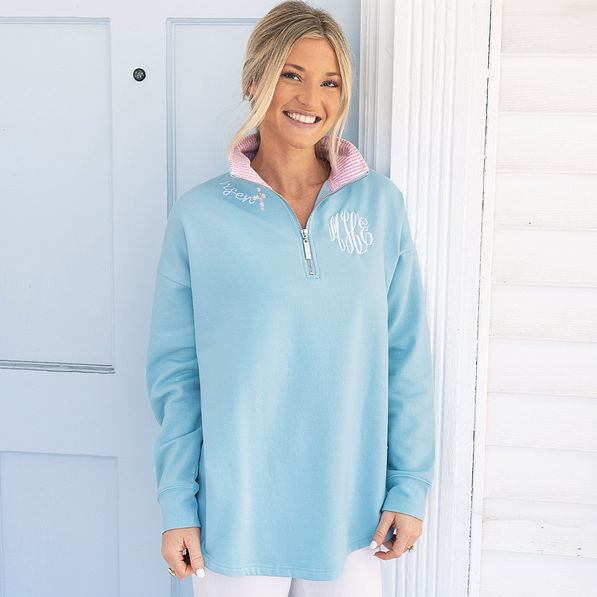 girl wearing personalized faith pullover in blue and pink seersucker