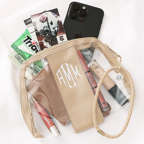 clear monogrammed wristlet with gameday football tickets