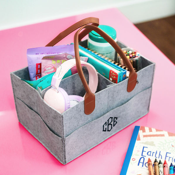 gray home organizer with pink background