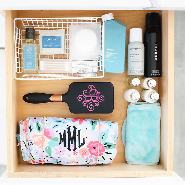 black hairbrush in drawer