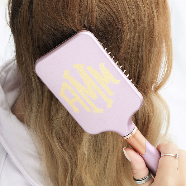 lavender hairbrush in hair