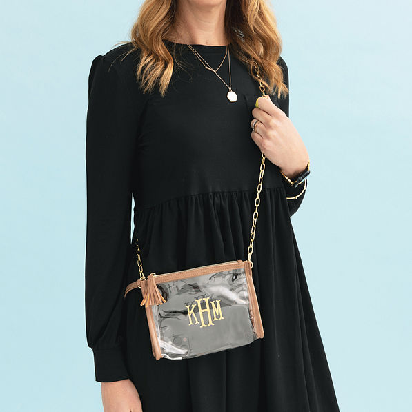 girl wearing black dress with personalized tan clear stadium bag