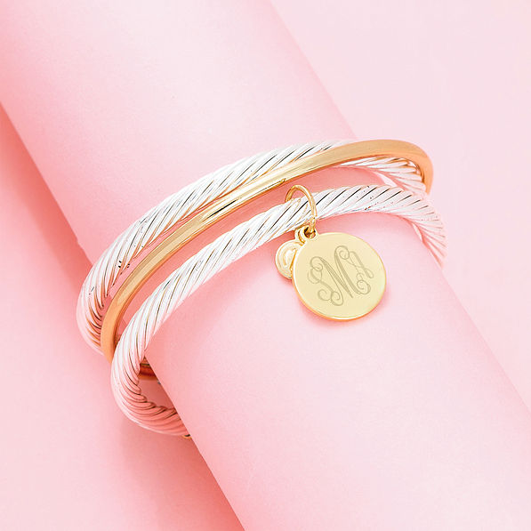 silver cable bracelet set on pink paper