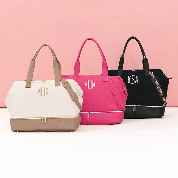 ivory hot pink and black monogrammed canvas weekenders