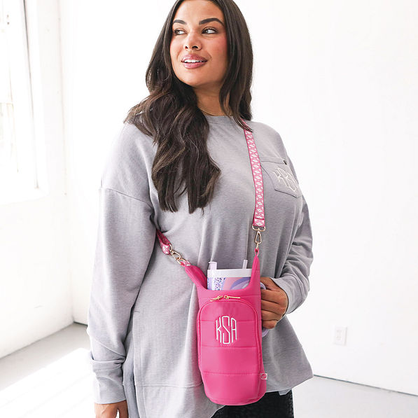 hot pink monogrammed water bottle carrier over shoulder