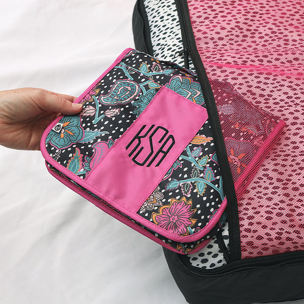 packable cosmetic bag in black spottie weekender duffle