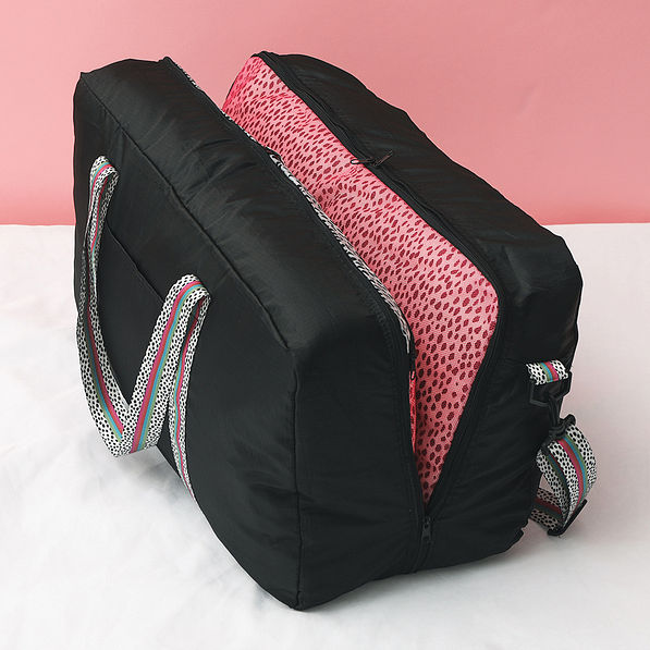 packable weekender in black spottie open