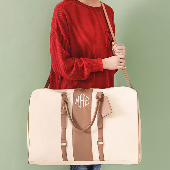 ivory personalized weekend bag over shoulder