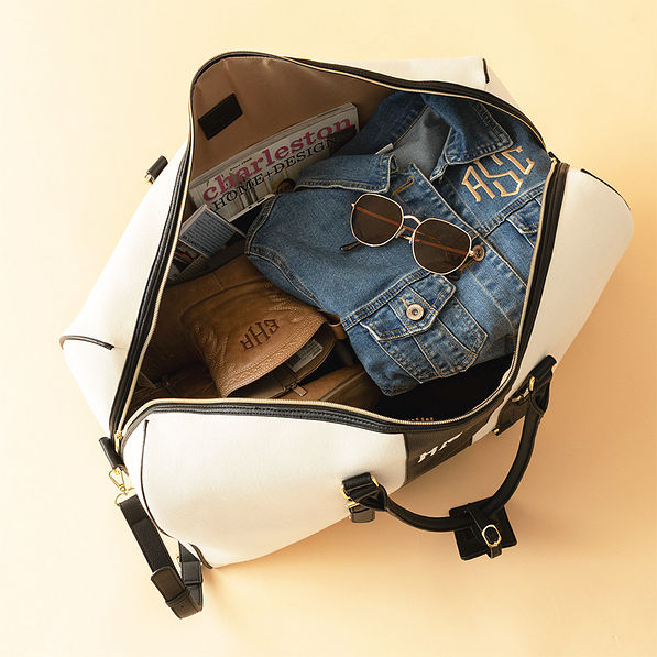 ivory/black weekender bag inside shot