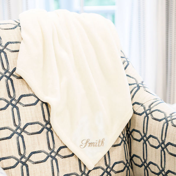 ivory plush blanket on chair