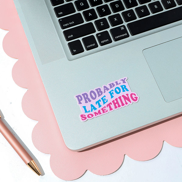 probably late sticker on laptop