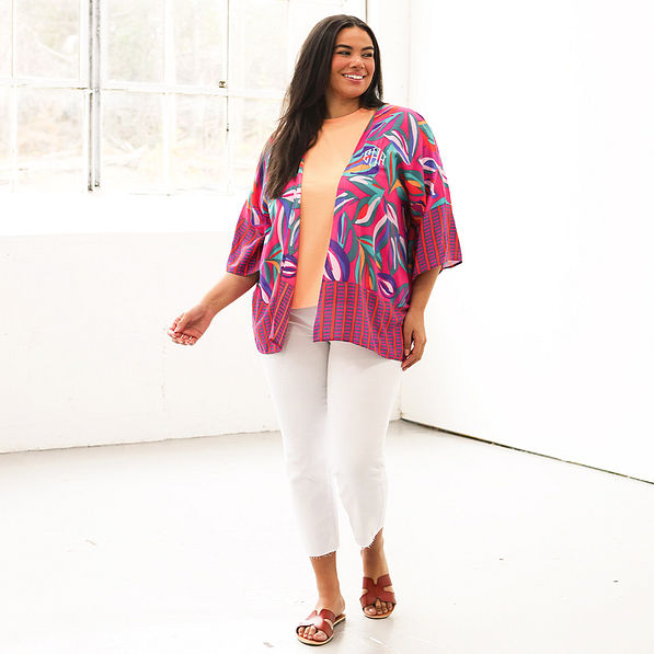 plus size model wearing short duster