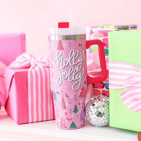 pink christmas holly jolly tumbler with presents
