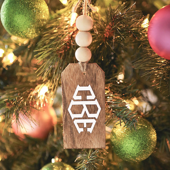 wooden personalized tag on christmas tree