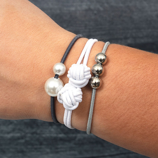 gray and white hair ties