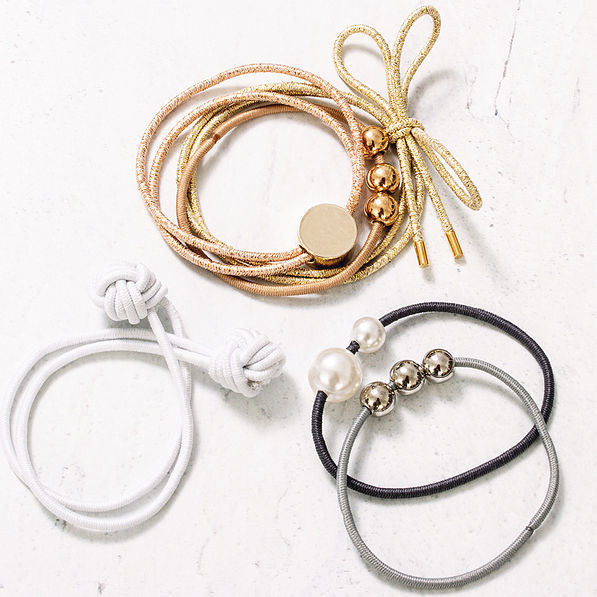 cute hair ties on vintage wood