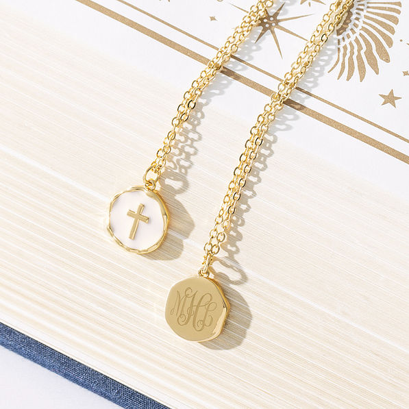 monogrammed reversible cross necklace front and back on bible