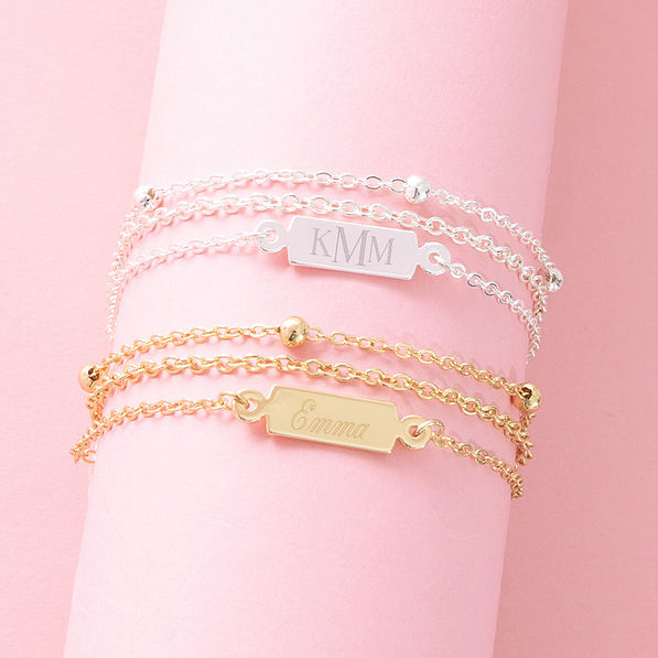 silver and gold multistrand bracelets together