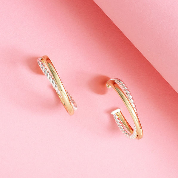 cable hoop earrings on pink background