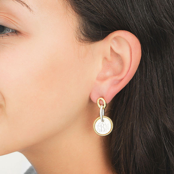 silver and gold cable drop earrings in ear