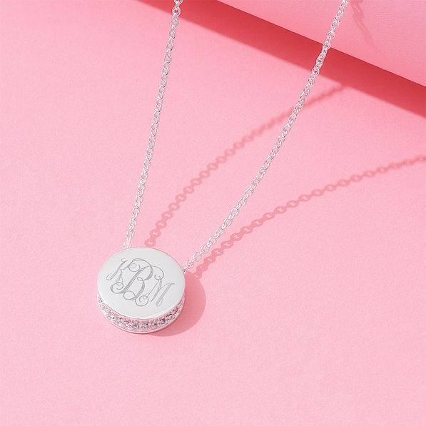 pave necklace on pink background