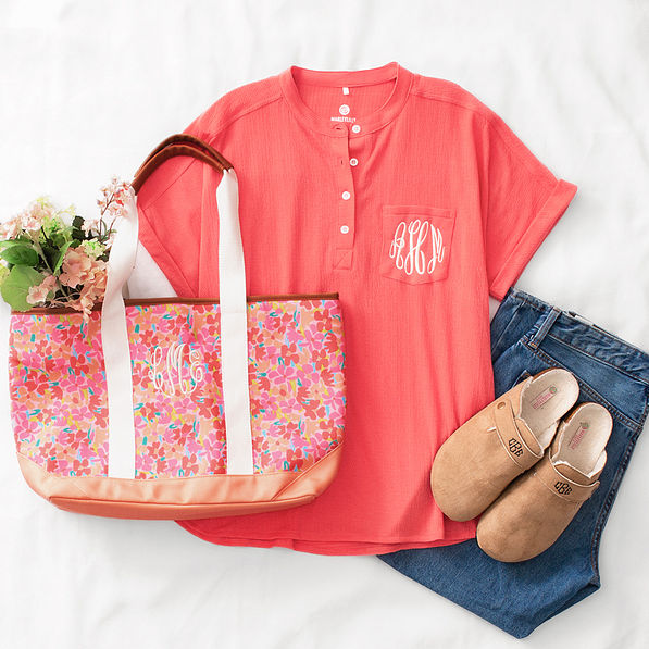 coral monogrammed top flatlay