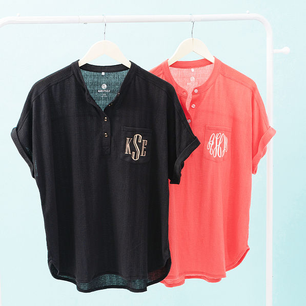 duo monogrammed tops in black and coral