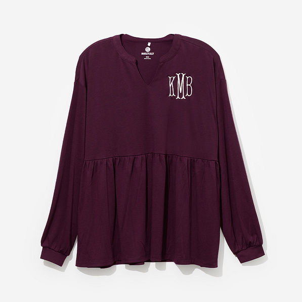 monogrammed peplum top in plum