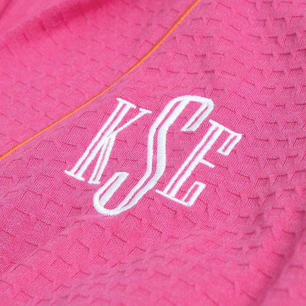 hot pink waffle robe up close of monogram