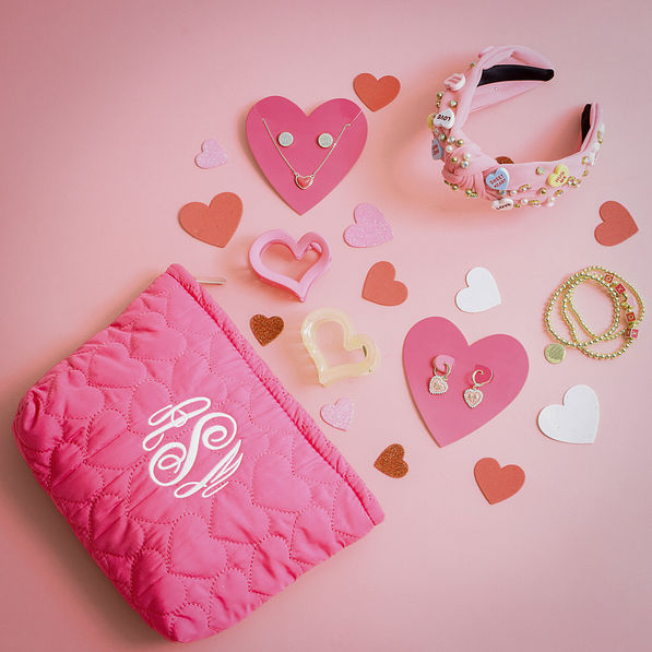 monogrammed heart cosmetic bag valentines flatlay