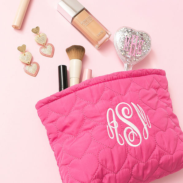 heart cosmetic bag with earrings spillshot.jpg