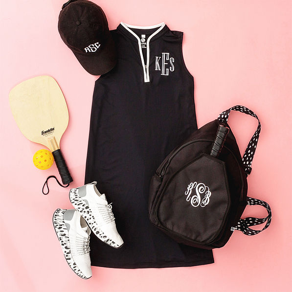 black quarter zip dress flatlay