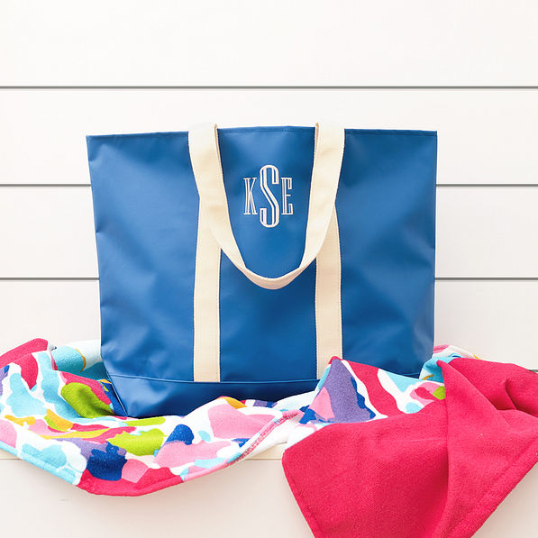 blue waterproof tote with beach towel