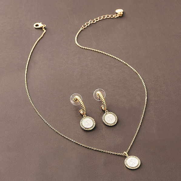 silver and gold cable hoop earrings with necklace